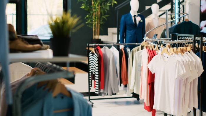 interior-clothing-store-with-stylish-merchandise-racks-fashionable-brand-design-casual-wear-modern-boutique-empty-fashion-showroom-shopping-centre-with-elegant-merchandise (1)