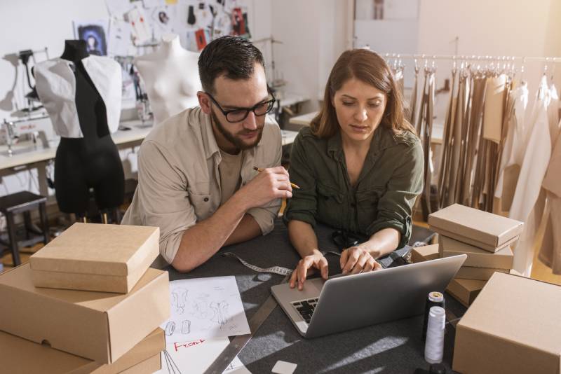 seamstresses-team-ready-ship-package-client-with-new-clothes (1)